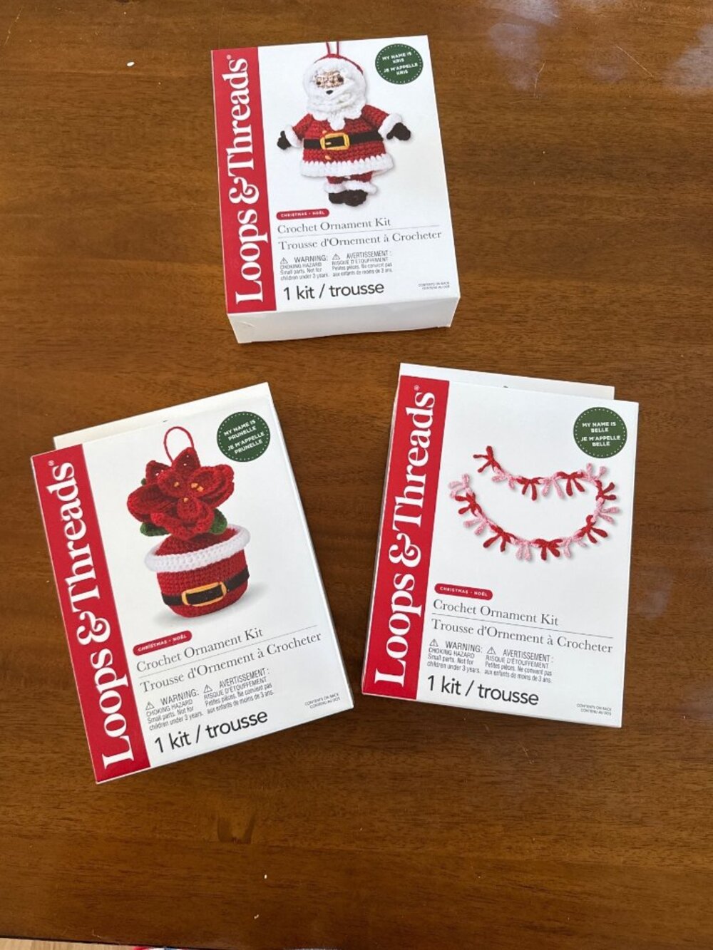 Loops & Threads Christmas Crochet Ornament Kit - Santa Poinsettia & Garland - Picture 1 of 7